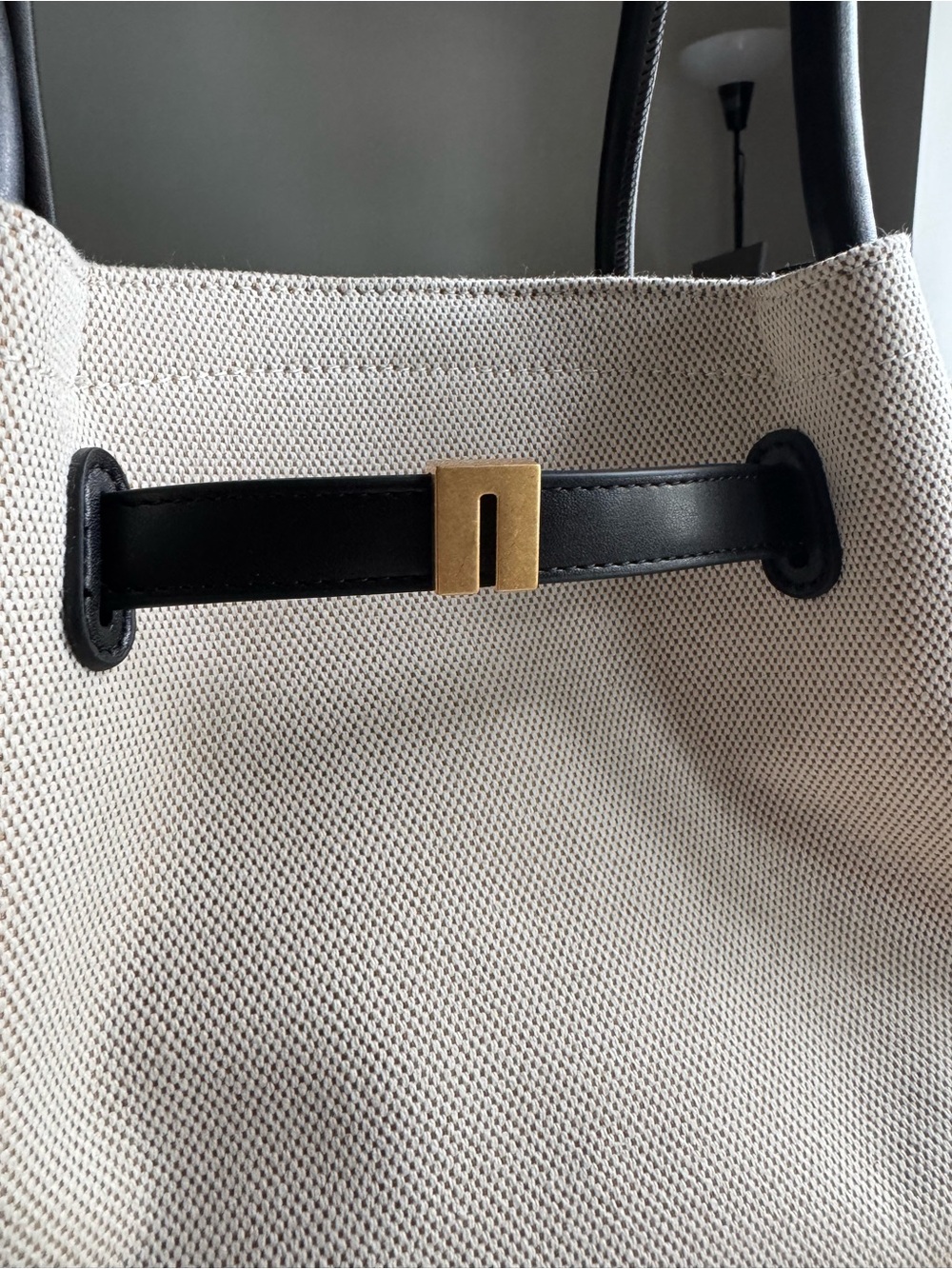JW PEI Beige Canvas Tote with Black Trim and Gold Accent
